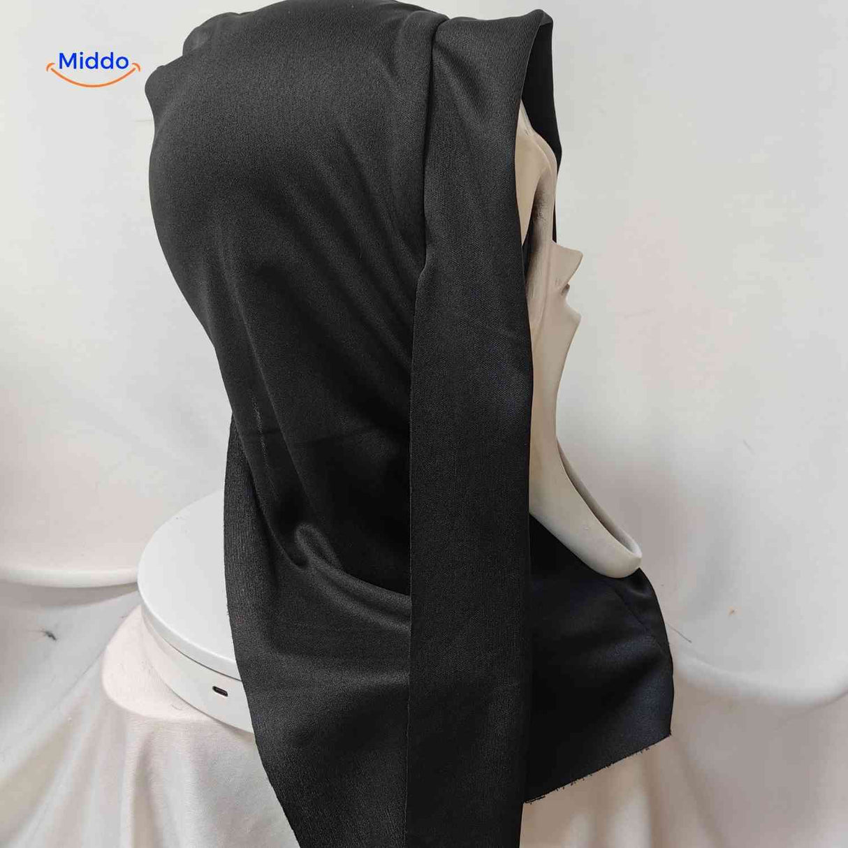 Scary skull mask side view featuring attached black hood.