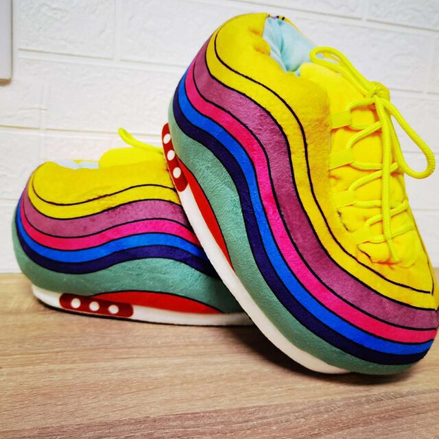 Rainbow sneaker slippers offering warm comfort with fashionable multi-color design.