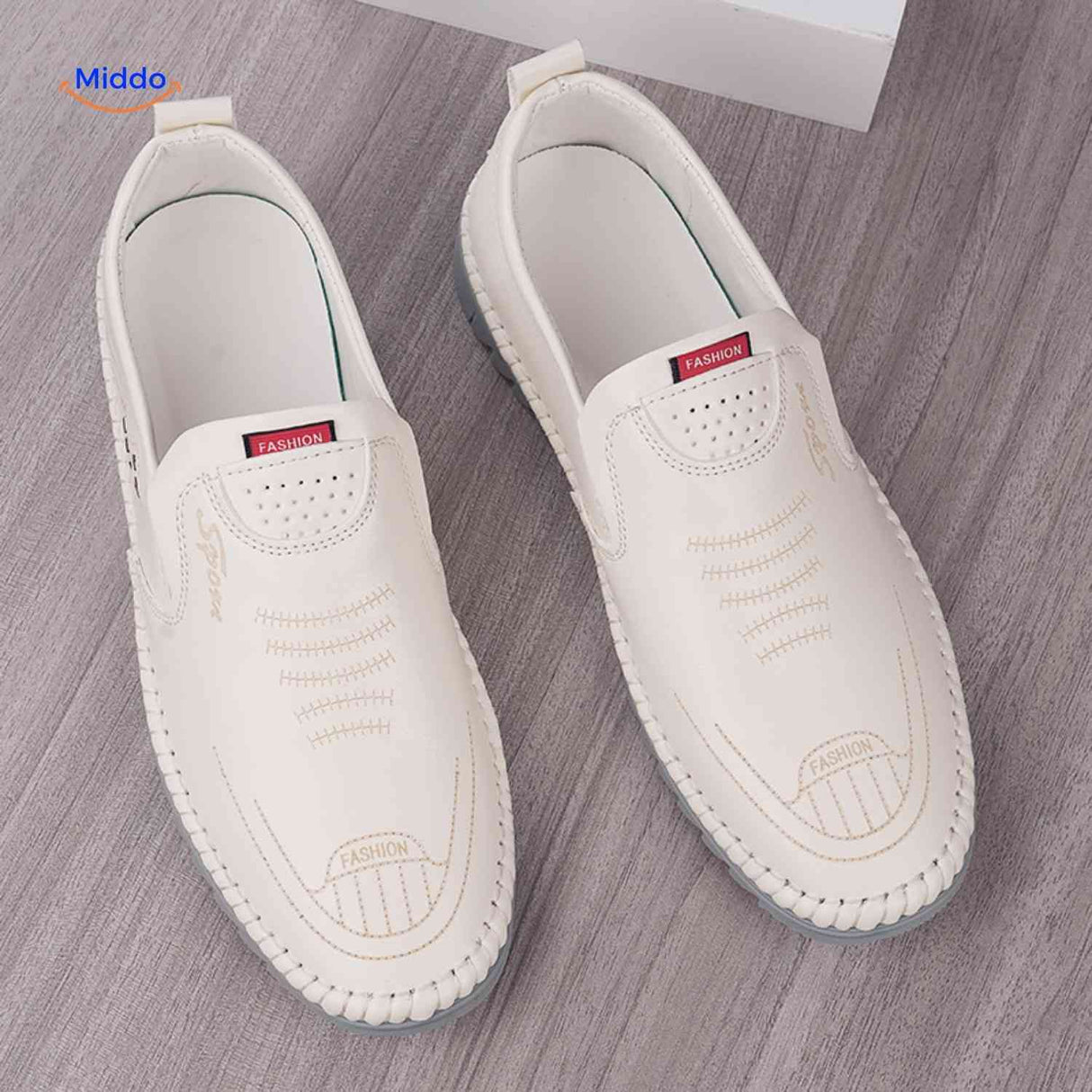 White trendy Solura loafers offering comfortable slip-on style for men.