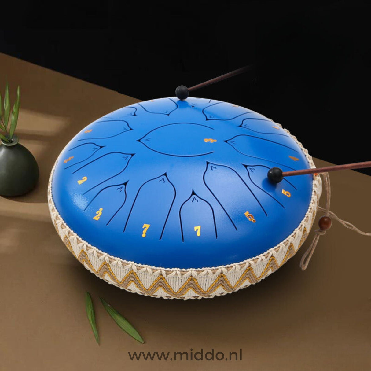 Blue 33cm steel tongue drum handpan instrument.
