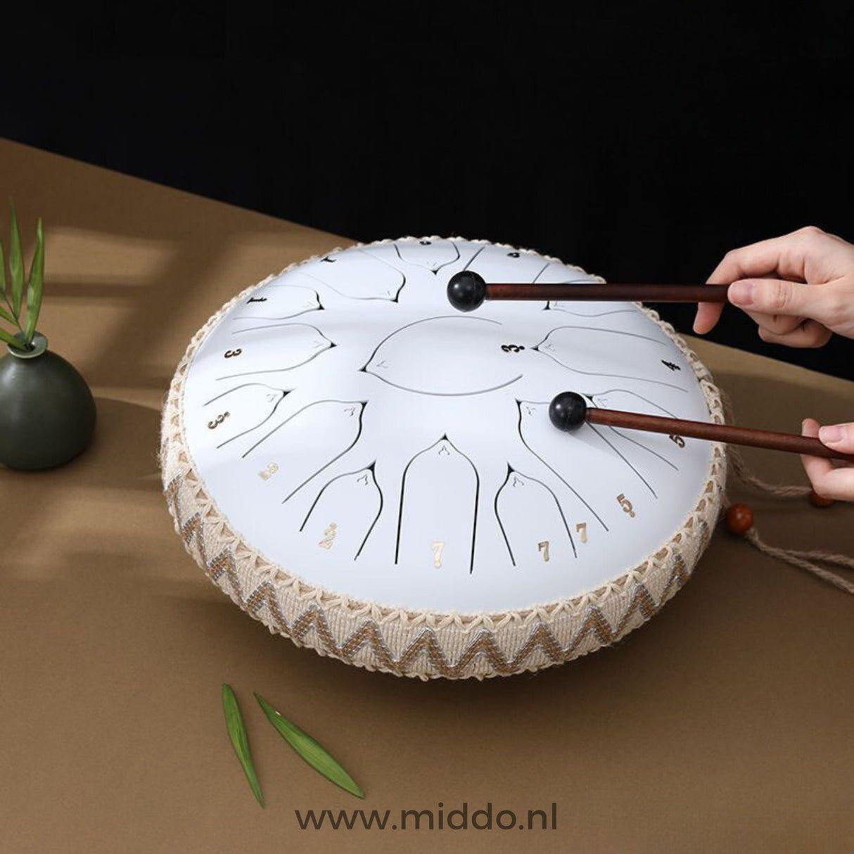 White 33cm steel tongue drum handpan instrument.