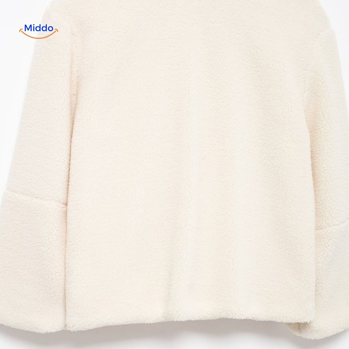 White teddy wool coat pocket detail showing functional design and placement.