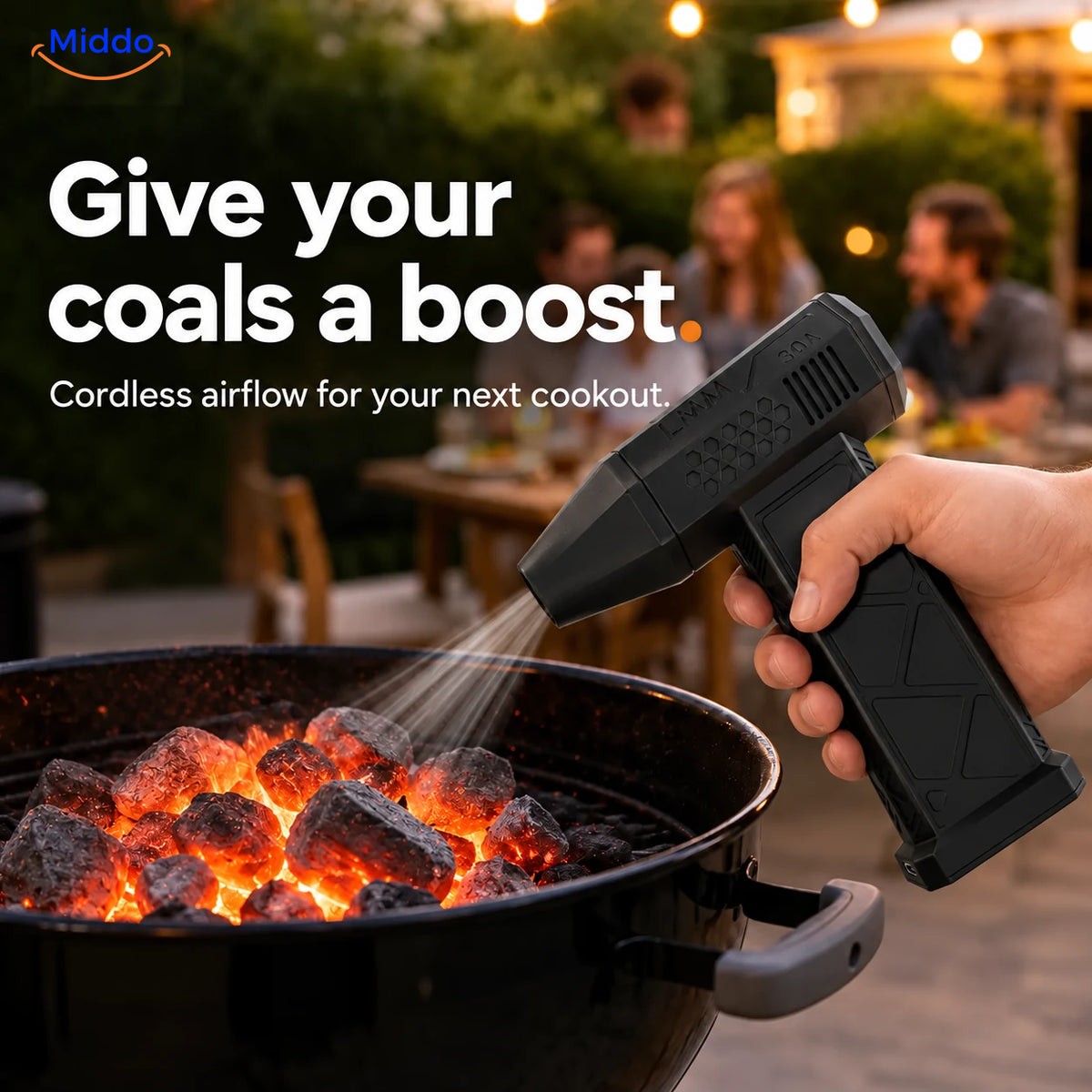 Black TurboJet Pro adding airflow to glowing charcoal in an outdoor grill