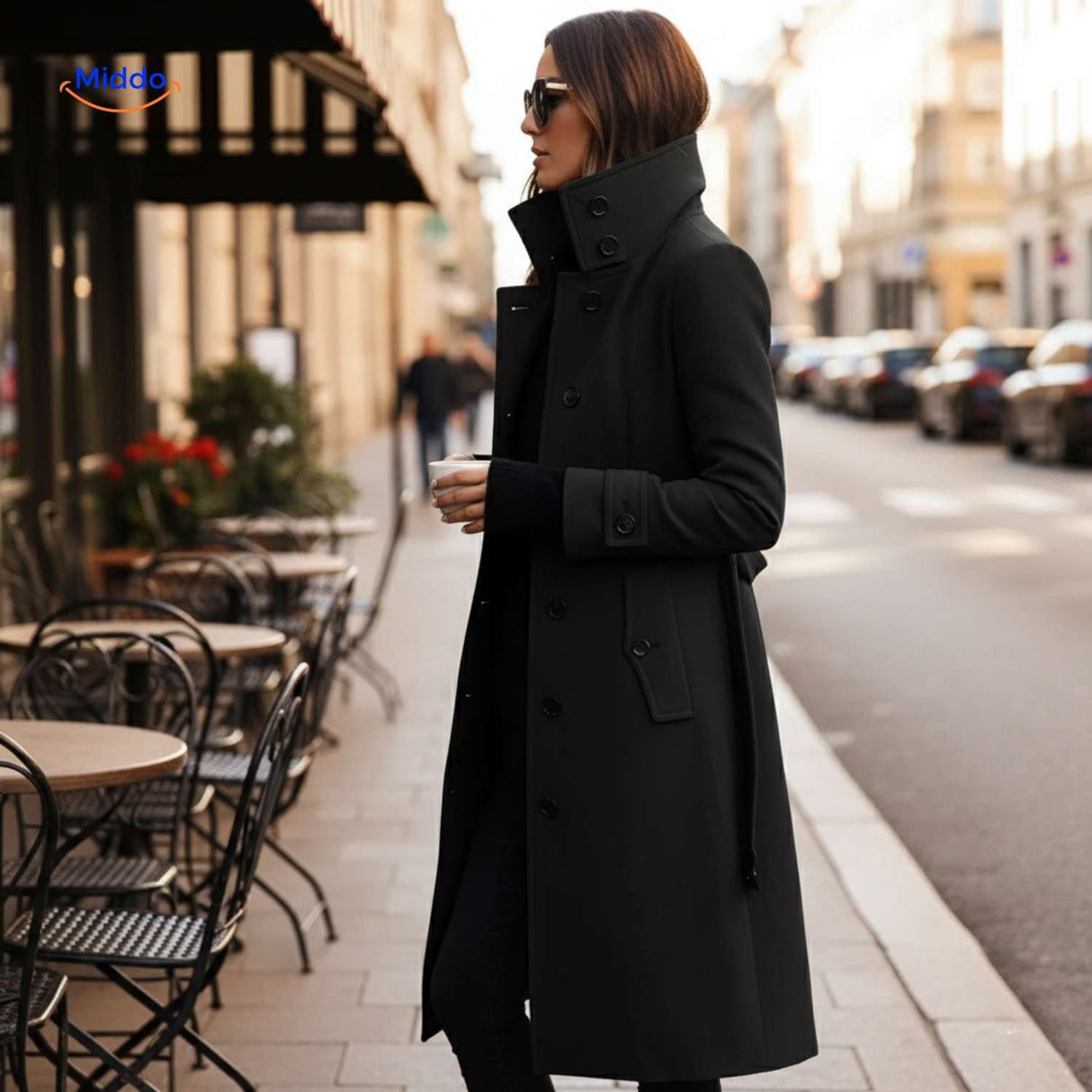 Black Veloura button-front coat with high collar elegant design.