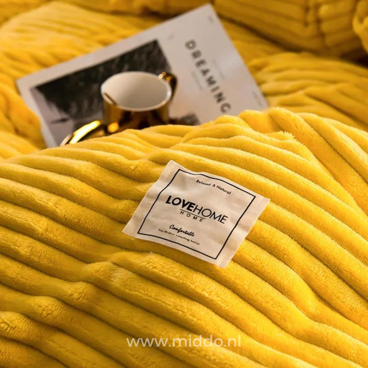 Luxurious velvet fleece duvet cover shown on bed with bedding.