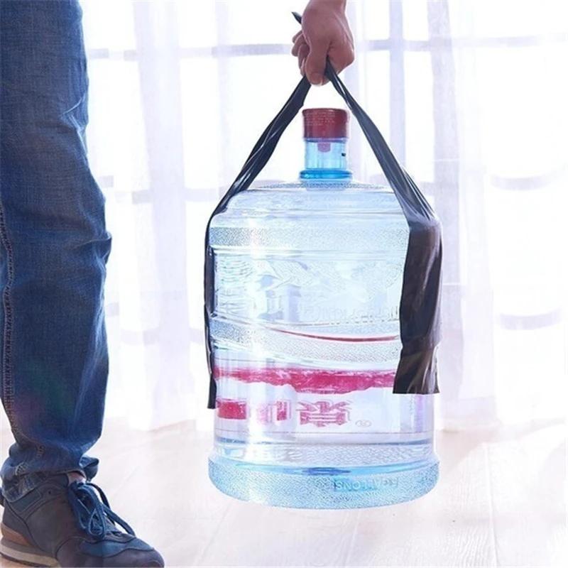Waterproof tape securing a water bottle in hands during outdoor use.