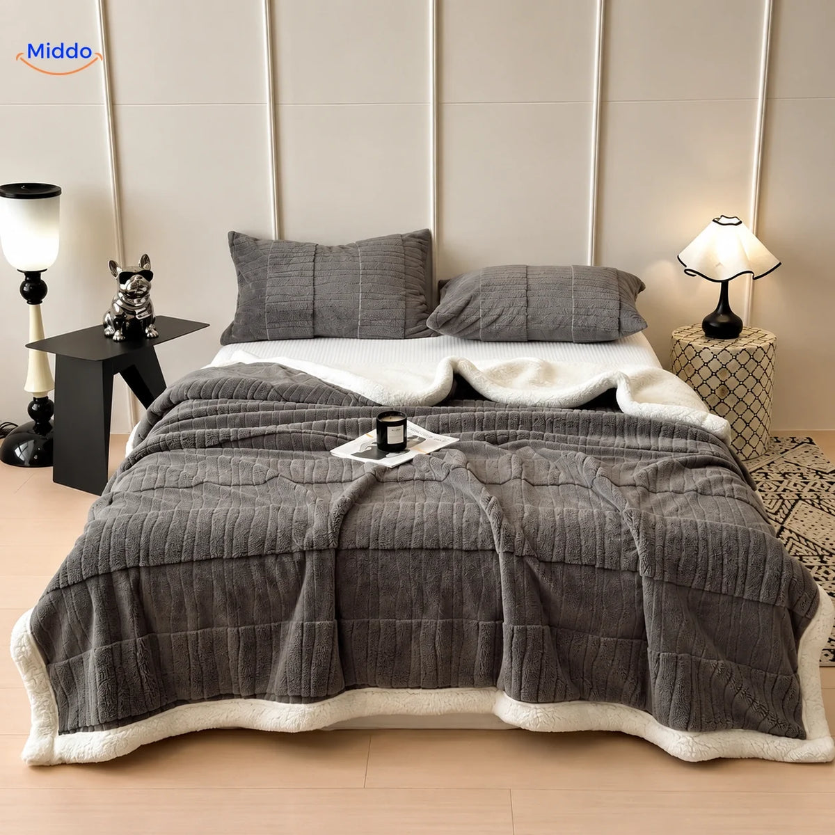 Winterra throw blanket with wave texture in dark gray and soft fleece reverse