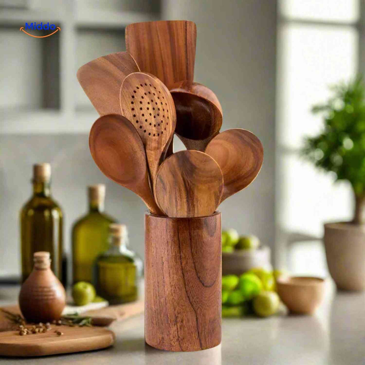 Wooden spoons and spatulas neatly organized in a teak wood utensil holder.