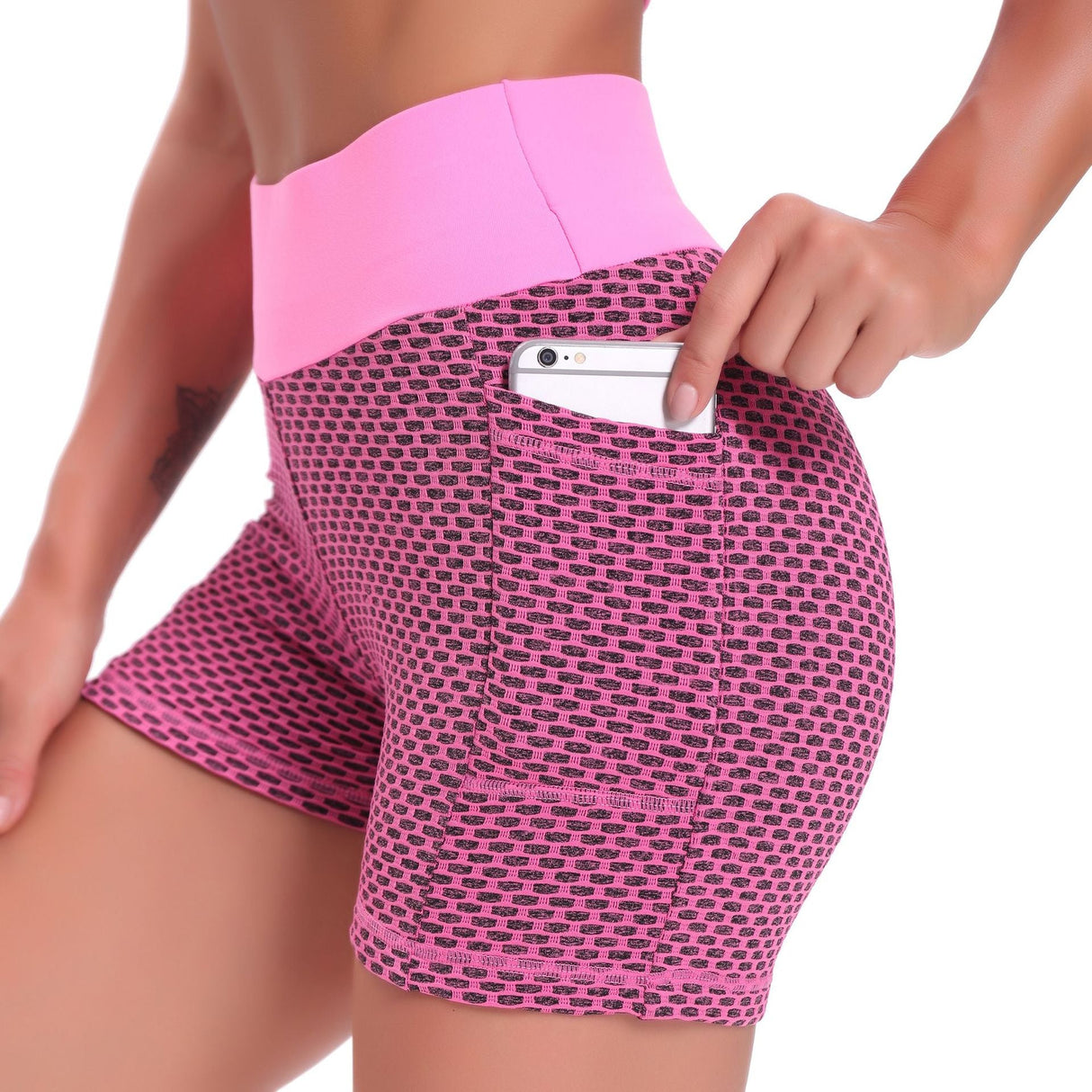 Rose pink high-waisted yoga shorts with breathable jacquard construction and flattering fit.