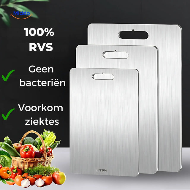 Three SafeCut stainless steel cutting boards in graduated sizes beside a basket of vegetables