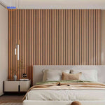 3D self-adhesive wood slat wall panels installed as a full natural-grain feature wall.