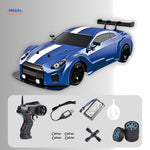 4WD drift RC car in blue shown with all included accessories