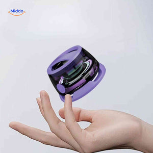Compact MagniBeat speaker held in one hand