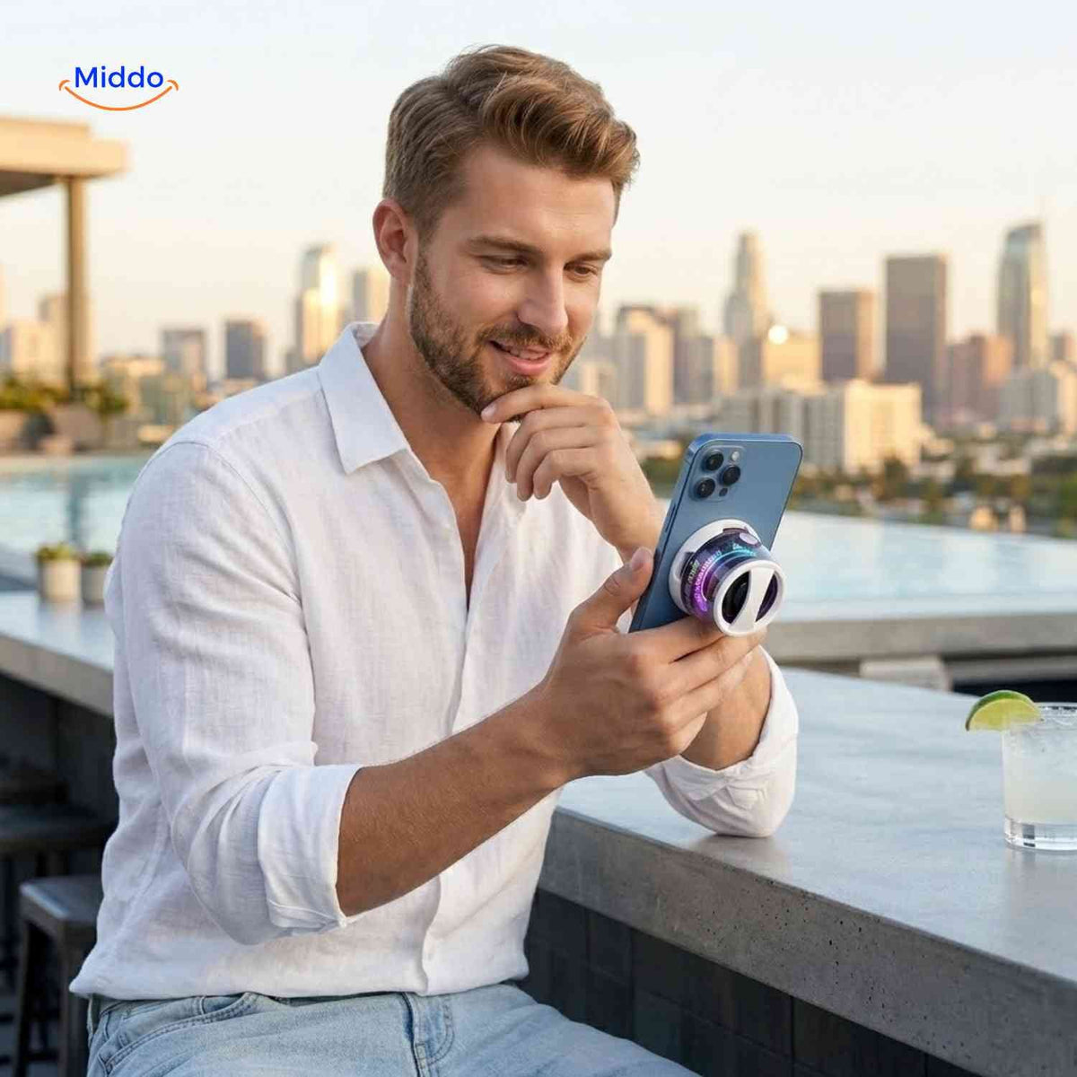 MagniBeat white speaker attached to a smartphone