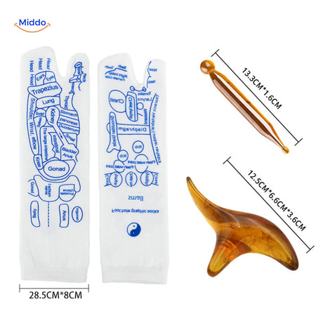 Acupoint acupressure socks paired with massage tools for enhanced therapy.