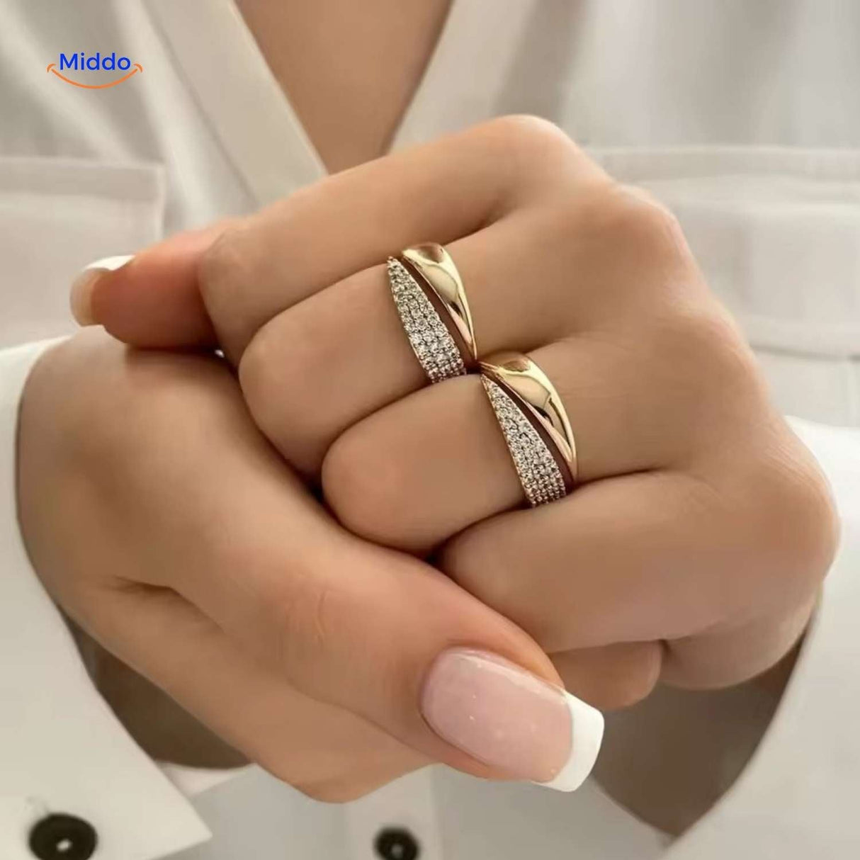 Adjustable ring with shimmering zirconia stones worn on hand.