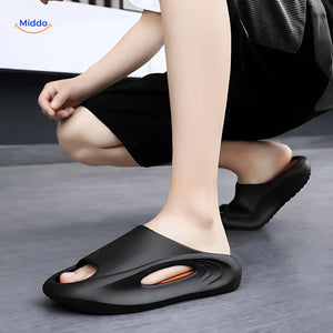 Man in black and orange Aerostep sport sandals showcasing durable summer comfort support.