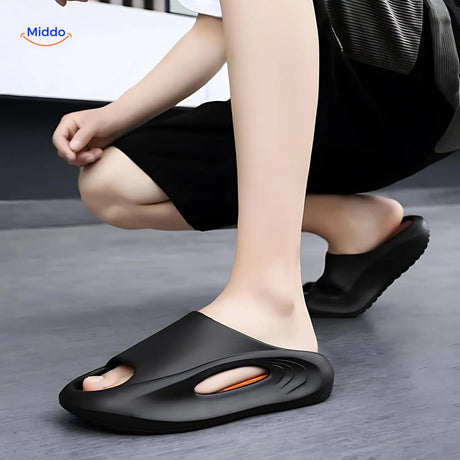 Man in black and orange Aerostep sport sandals showcasing durable summer comfort support.