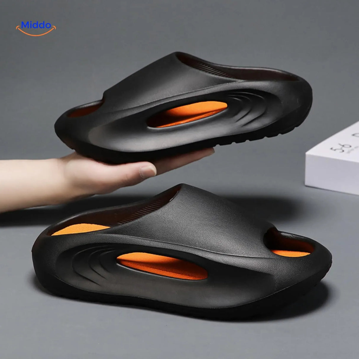 Aerostep men's sport sandals combining black with vibrant orange stripe for summer comfort.