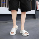 Aerostep white sport sandals being worn showing the thick sole support in action.