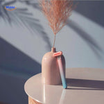 Red light therapy pen delivering rosy glow and anti-aging benefits for facial skin.