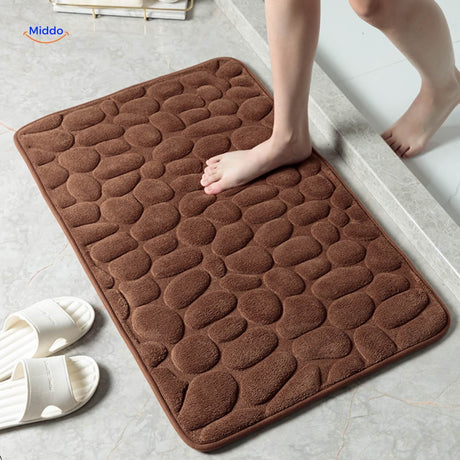 Anti-slip bath mat in brown color with durable waterproof construction.