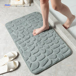 Anti-slip bath mat in gray color with non-slip backing for bathroom safety.