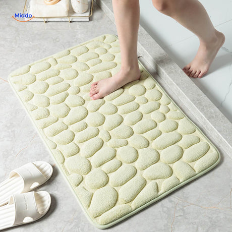 Anti-slip bath mat in light green offering waterproof and slip-resistant features.