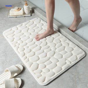 Anti-slip bath mat in white color providing safety and water absorption.