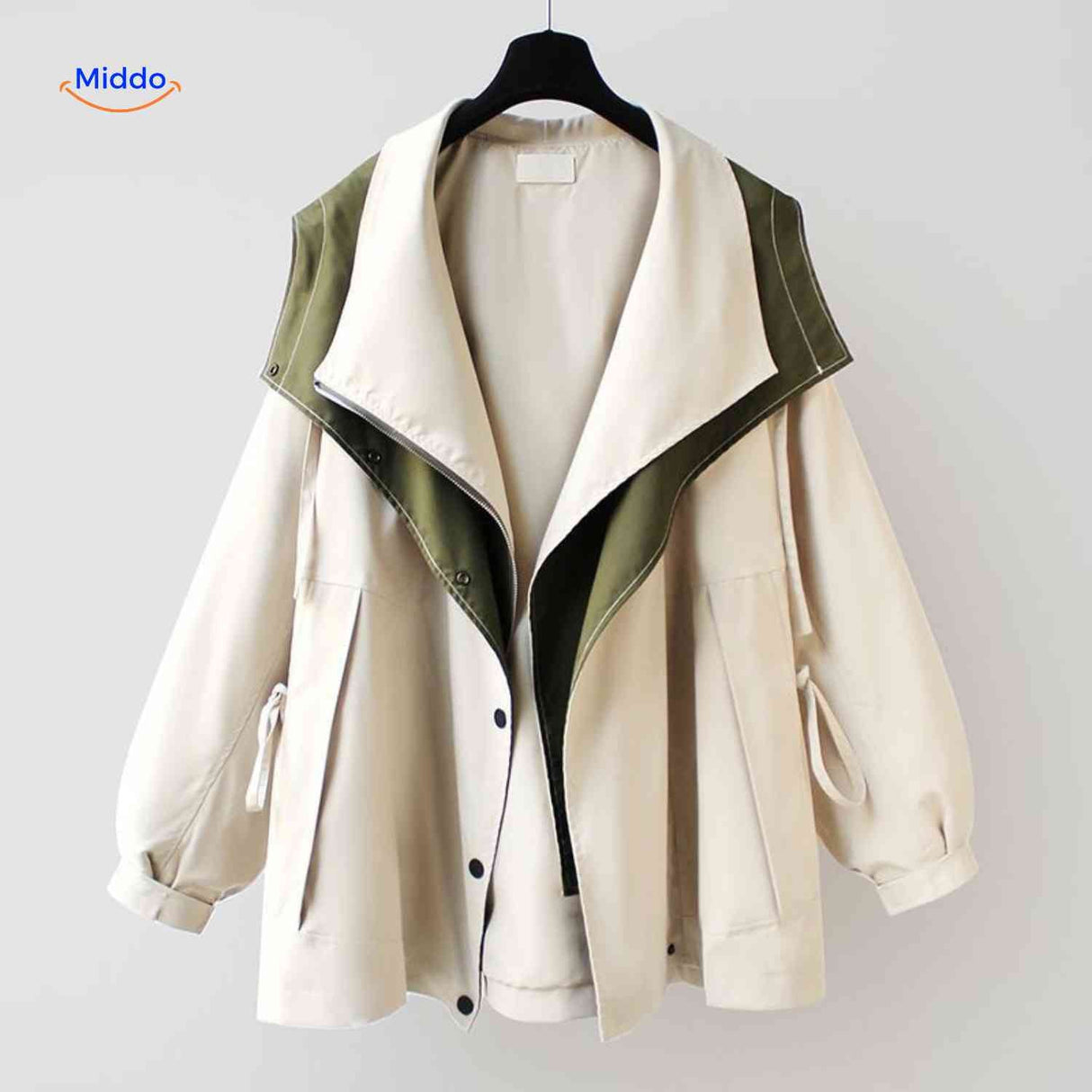 AquaShell women's trench coat in cream with green collar detail, oversized fit.