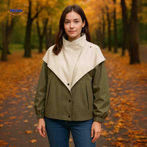 AquaShell trench coat in forest green with cream collar.