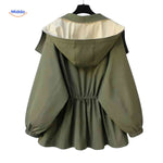 AquaShell water-repellent trench coat with hood in green and cream.