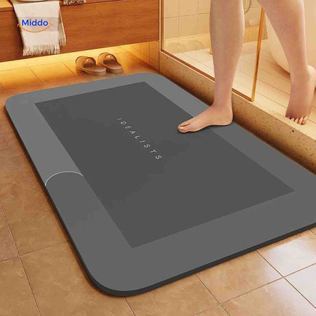 Dark gray bath mat featuring visible non-slip grip line pattern.
