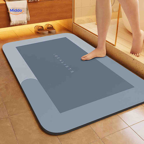 Light blue-gray rectangle quick-dry bath mat with absorbent surface.