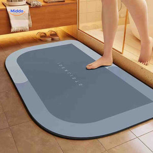 Flipped rectangle bath mat displays non-slip backing technology.