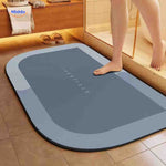 Flipped rectangle bath mat displays non-slip backing technology.