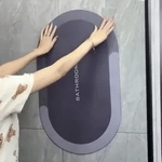 Quick-dry bath mat rolled up demonstrating flexible storage capability.