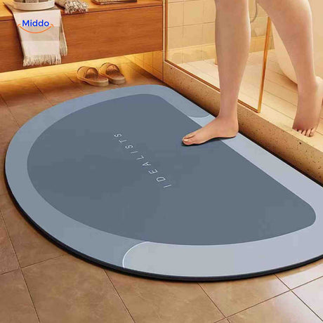Semi-circle quick-dry bath mat adds soft non-slip surface to bathroom.