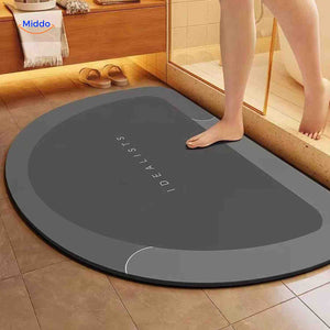 Dark gray semi-circle non-slip bath mat offers soft underfoot comfort.