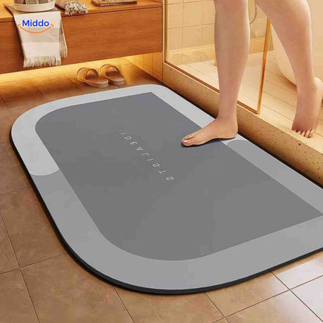 Semi-circle bath mat flipped to reveal water-resistant backing design.
