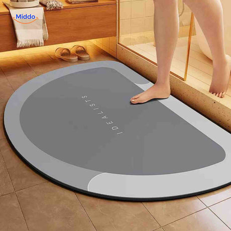 Light gray semi-circle quick-dry bath mat for versatile bathroom use.