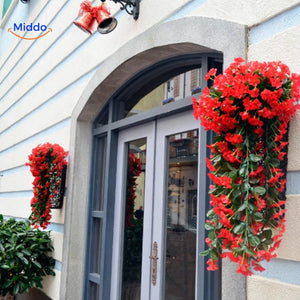 Artificial orchids creating a welcoming display at the front entrance.