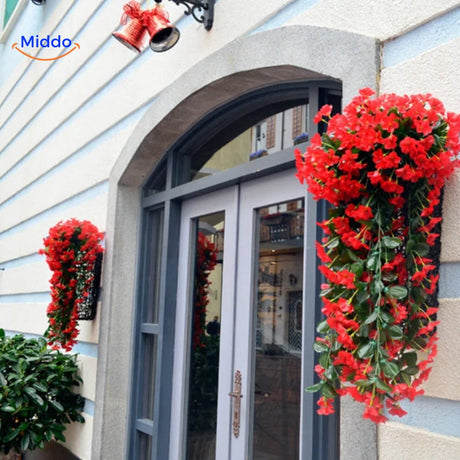 Artificial orchids creating a welcoming display at the front entrance.
