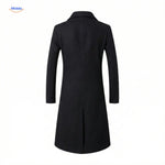 Back view of black wool trench coat showing fitted silhouette and seaming.