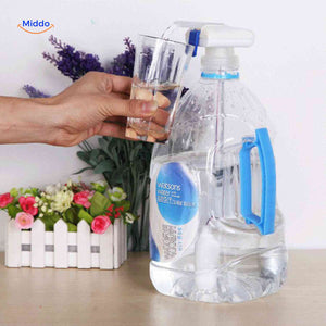 Automatic water pump dispenser mounted on beverage bottle.