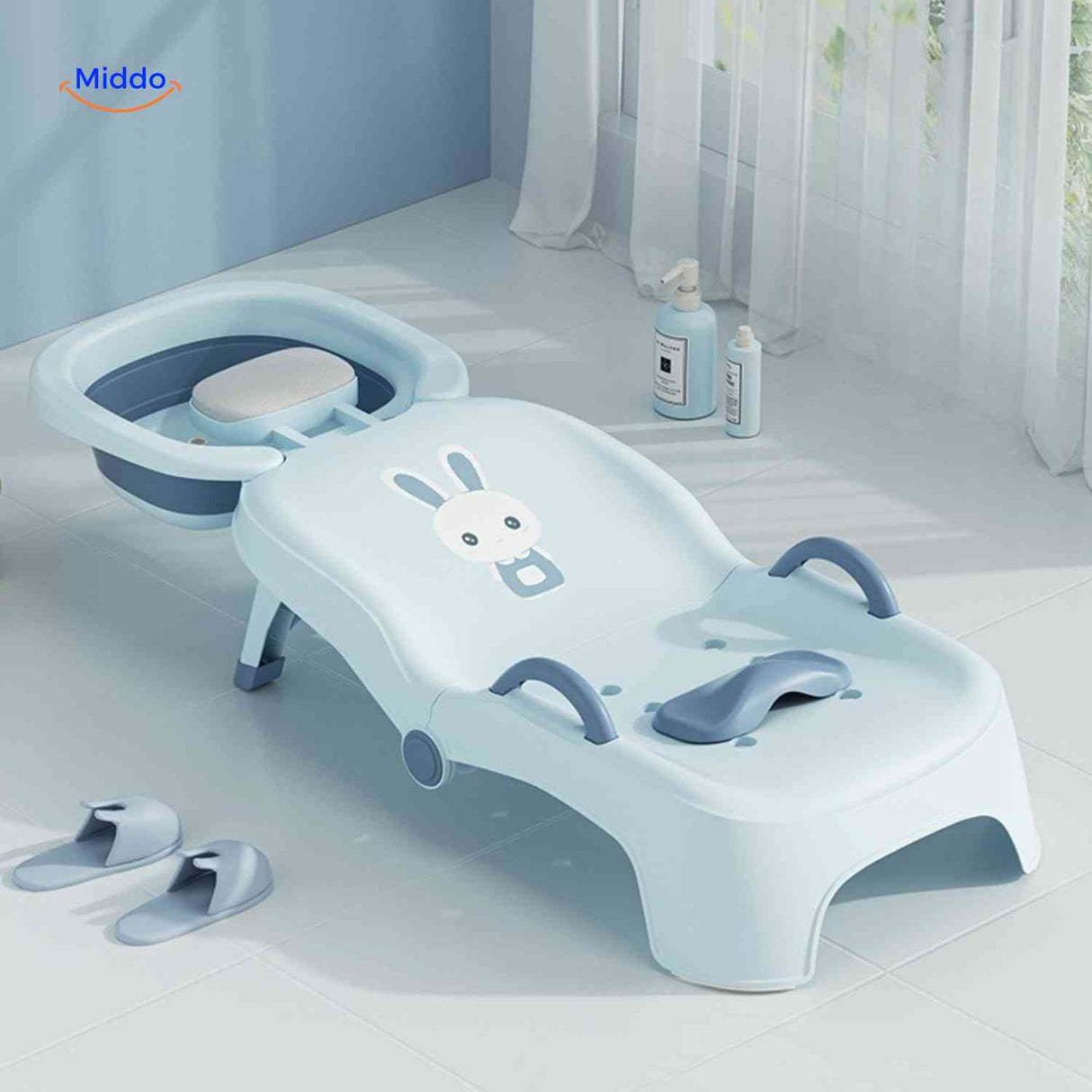 Blue baby shampoo chair featuring integrated water basin for hair washing.
