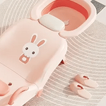 Baby shampoo chair with rabbit design pattern plus bonus slippers for comfortable bath play.