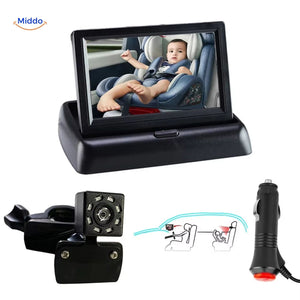 Automatic baby car camera with display unit monitoring infant in car seat.