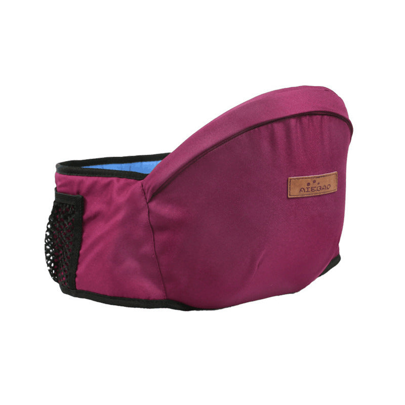 Dark pink baby hip carrier featuring breathable mesh pocket for storage and ventilation.