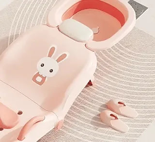 Baby shampoo chair with rabbit design pattern plus bonus slippers for comfortable bath play.